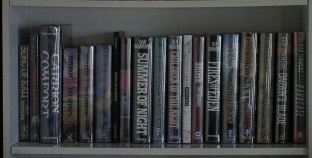 A Huge BookShelf Full of Dan Simmons' Books